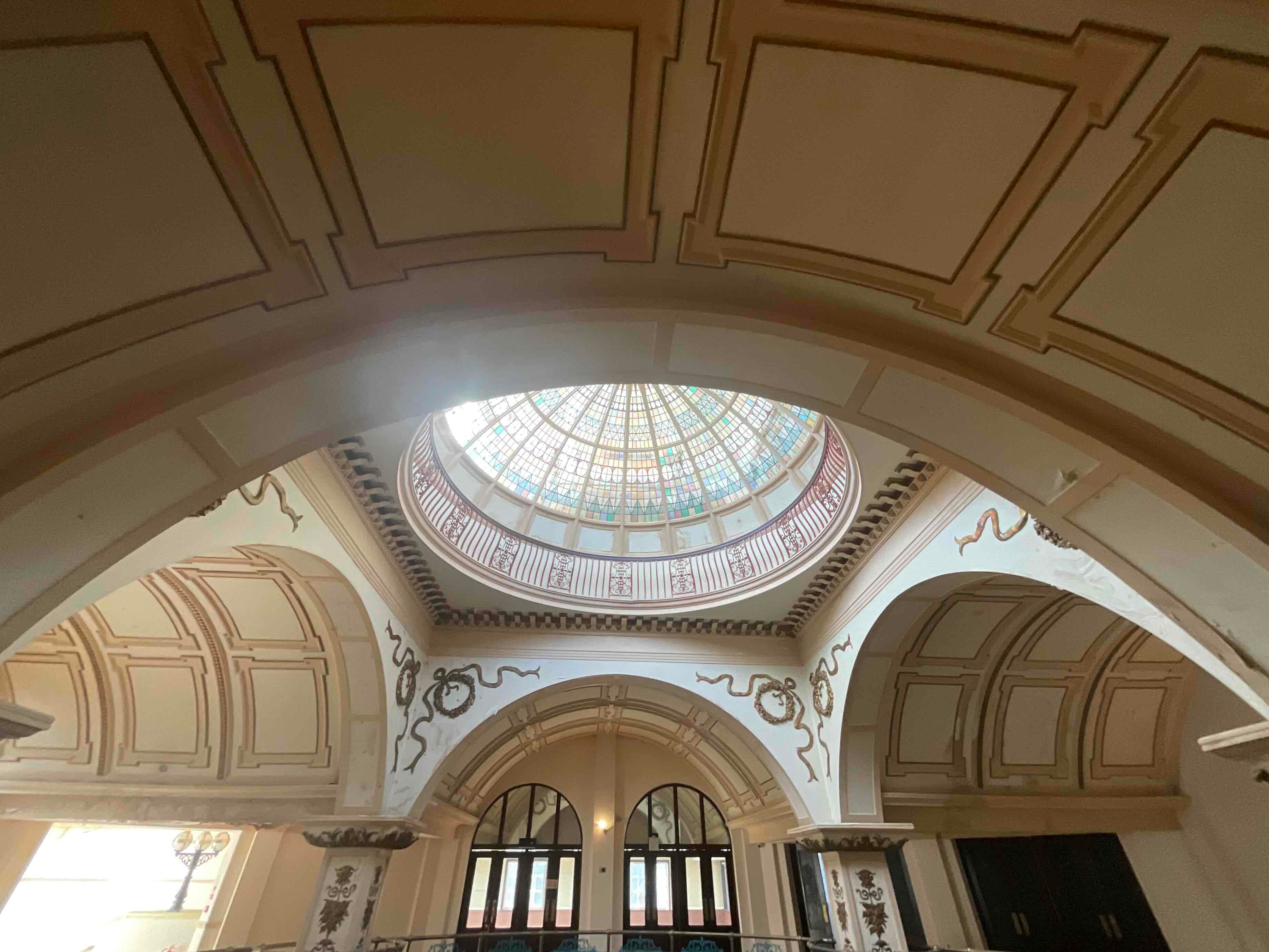 Domed interior of a period commercial building under refurbishment planning.